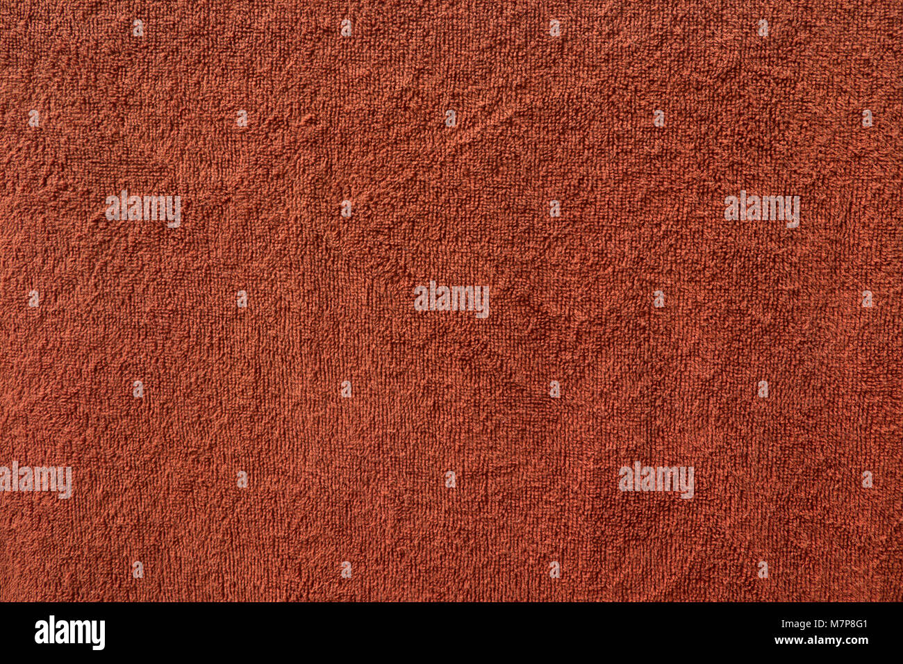 Red brown towel fabric texture. Stock Photo