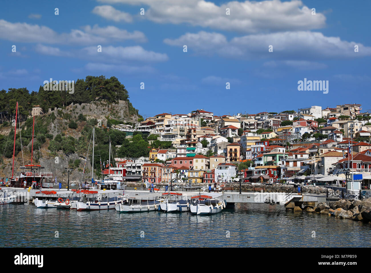 castle on hill and old colorful buildings Parga Greece Stock Photo