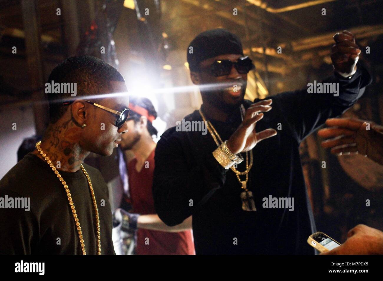 (LR) Soulja Boy and 50 Cent onset of their music video 'Mean Mug
