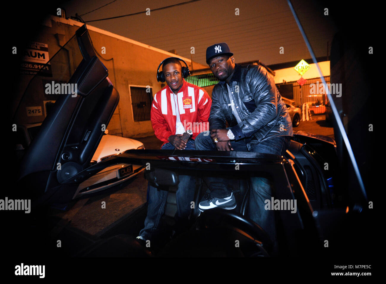 L-R) YG & 50 Cent sitting in a Ferrari on November 18, 2010 in Los Angeles  Stock Photo - Alamy