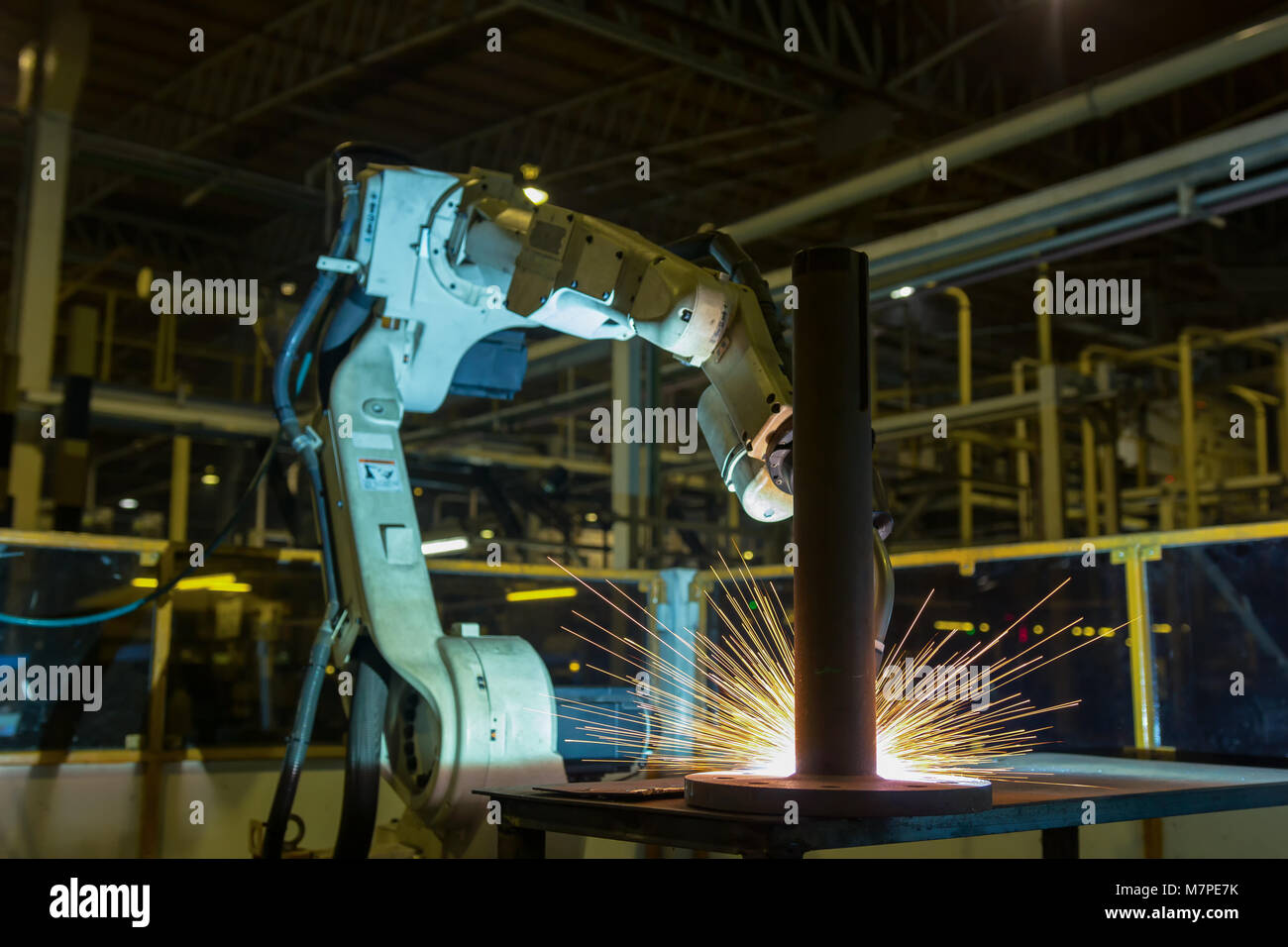 Robots welding in a car factory. Welding car body Stock Photo