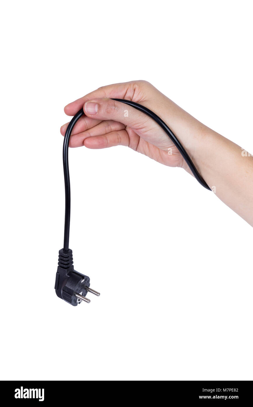 hand holding black Electric plug isolated on white background Stock Photo