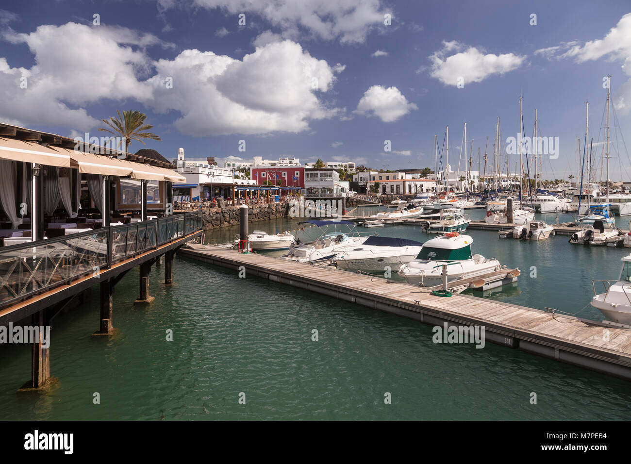 Boats moored in the harbour at Playa Blanca, Lanzarote, Canary Islands Stock Photo