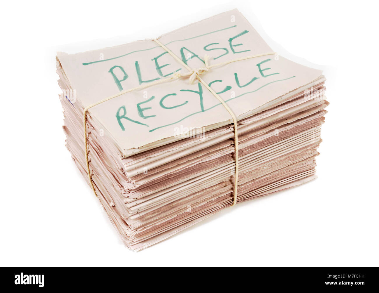 Bundle of newspapers with recycle notice Stock Photo