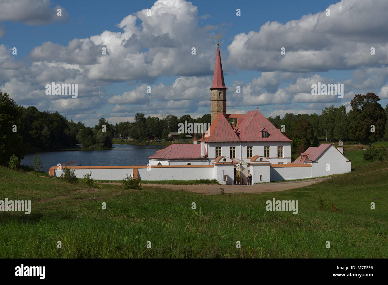 Gatchina, St. Petersburg, Russia - August 30, 2015: People in front of the Priory Palace. It was built in 1799 by the architect N. A. Lvov mostly usin Stock Photo