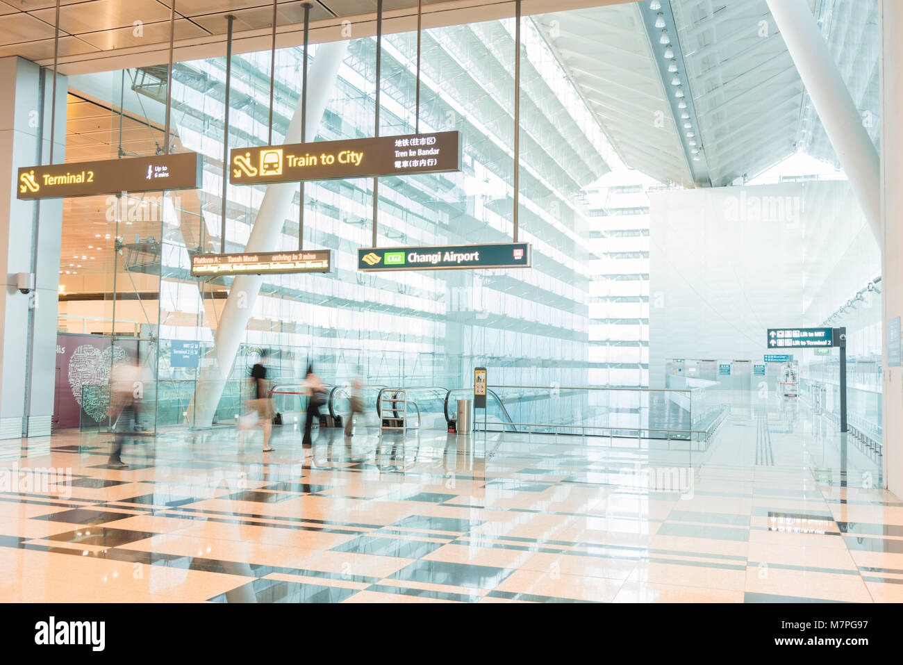 Architecture and travelers at Changi Airport Terminal 3 Stock Photo