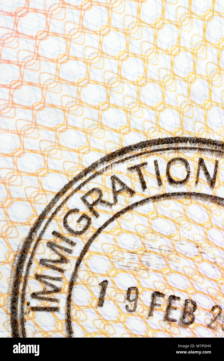 Immigration entry stamp on the inside page of a passport. Space for