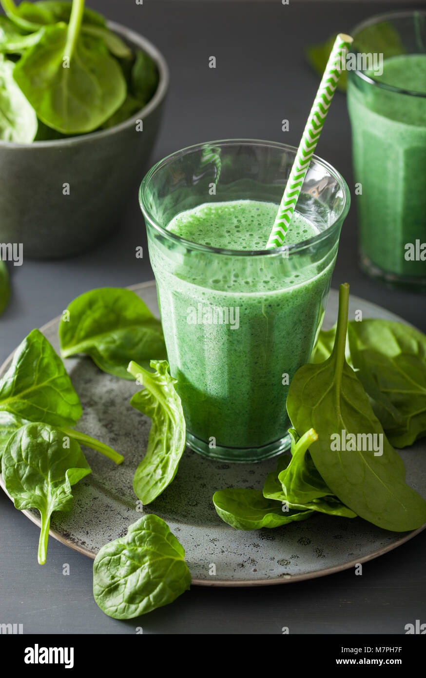green spinach smoothie with spirulina, chia seed, lime, apple Stock
