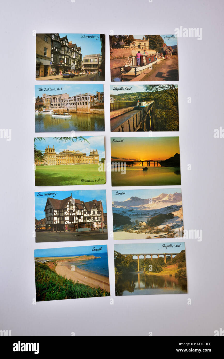 Ten assorted J Salmon Ltd postcards depicting English and Welsh views, shown on a white background. Stock Photo