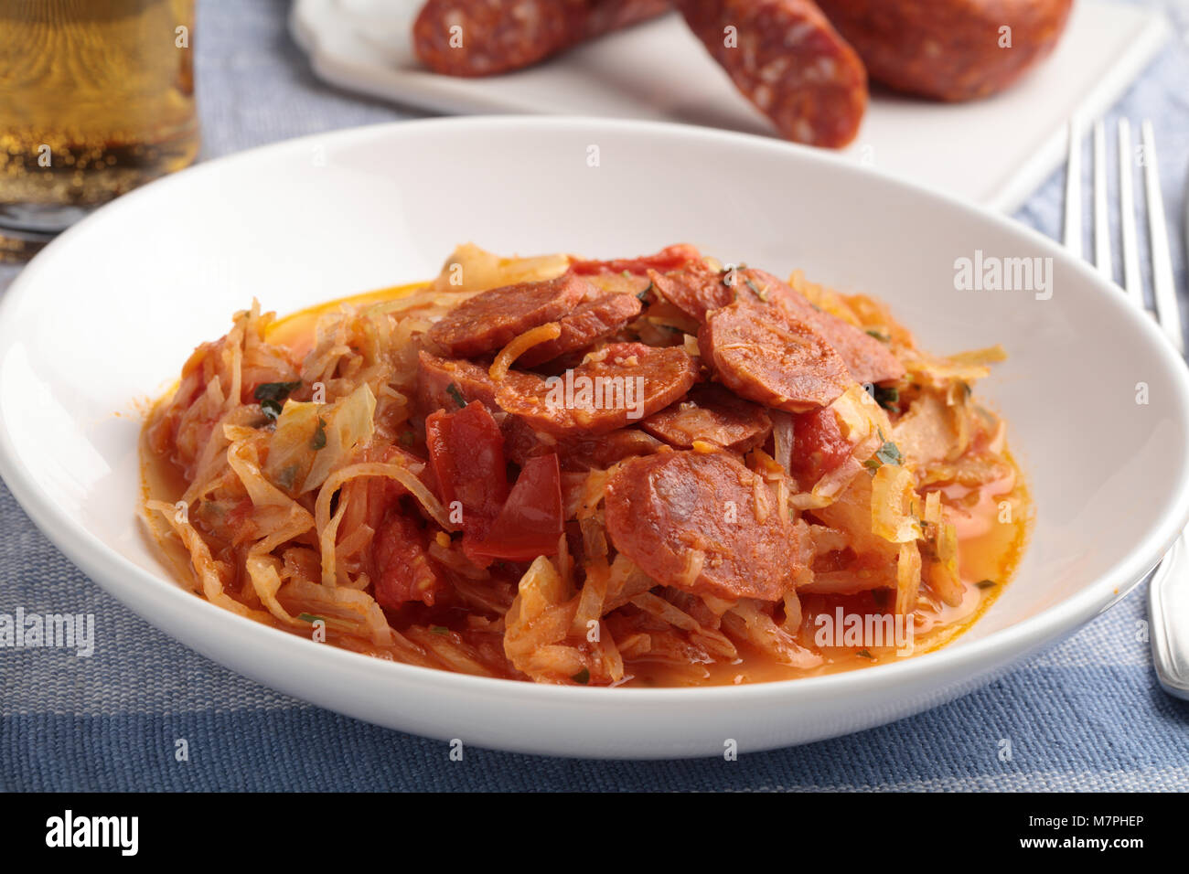 Braised cabbage with chorizo sausage and beer Stock Photo Alamy