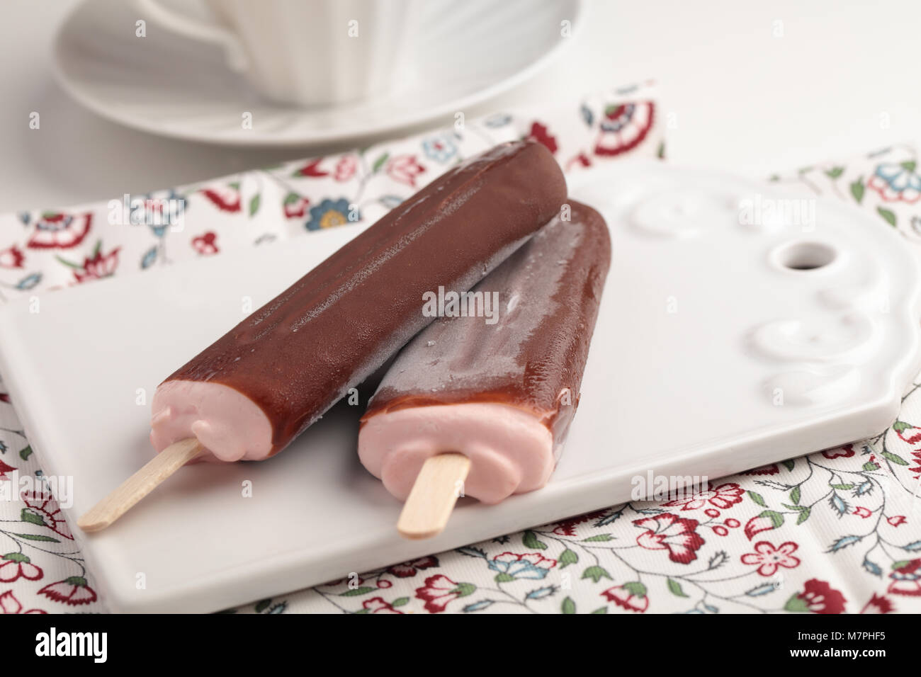 Ice cream bars coated with chocolate Stock Photo