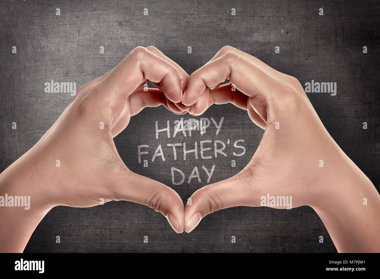 Hands with heart shape with Happy fathers day messages. Fathers day concept Stock Photo