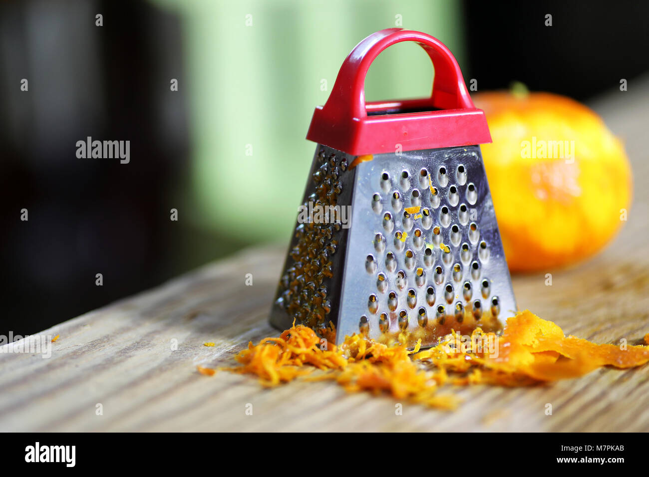 grater zest of citrus fruit and on wooden table Stock Photo Alamy