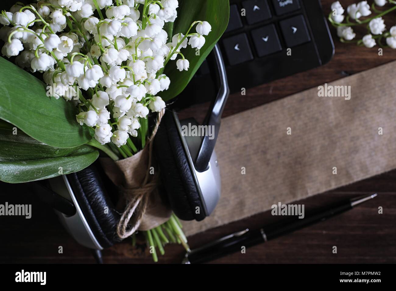 Bouquet of lilies of the valley on a table Stock Photo - Alamy
