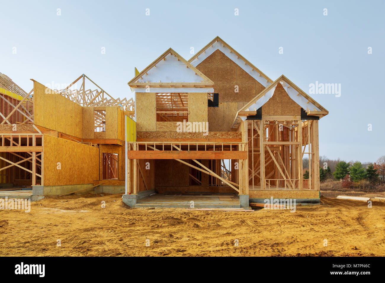 New construction of a house Framed New Construction of a House Building a new house from the ground up Stock Photo