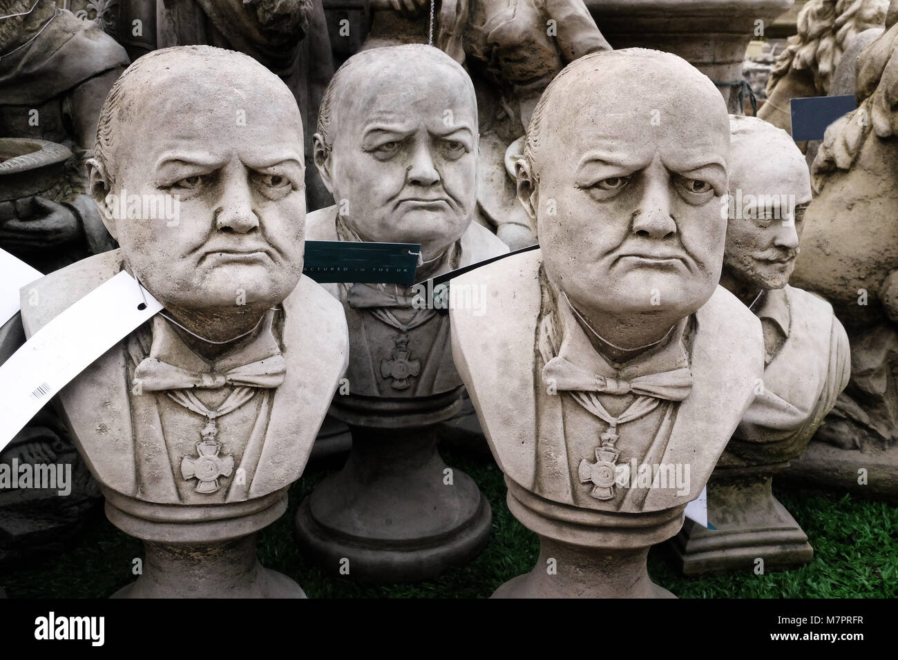 Concrete cast busts of Winston Churchill on sale in a garden center