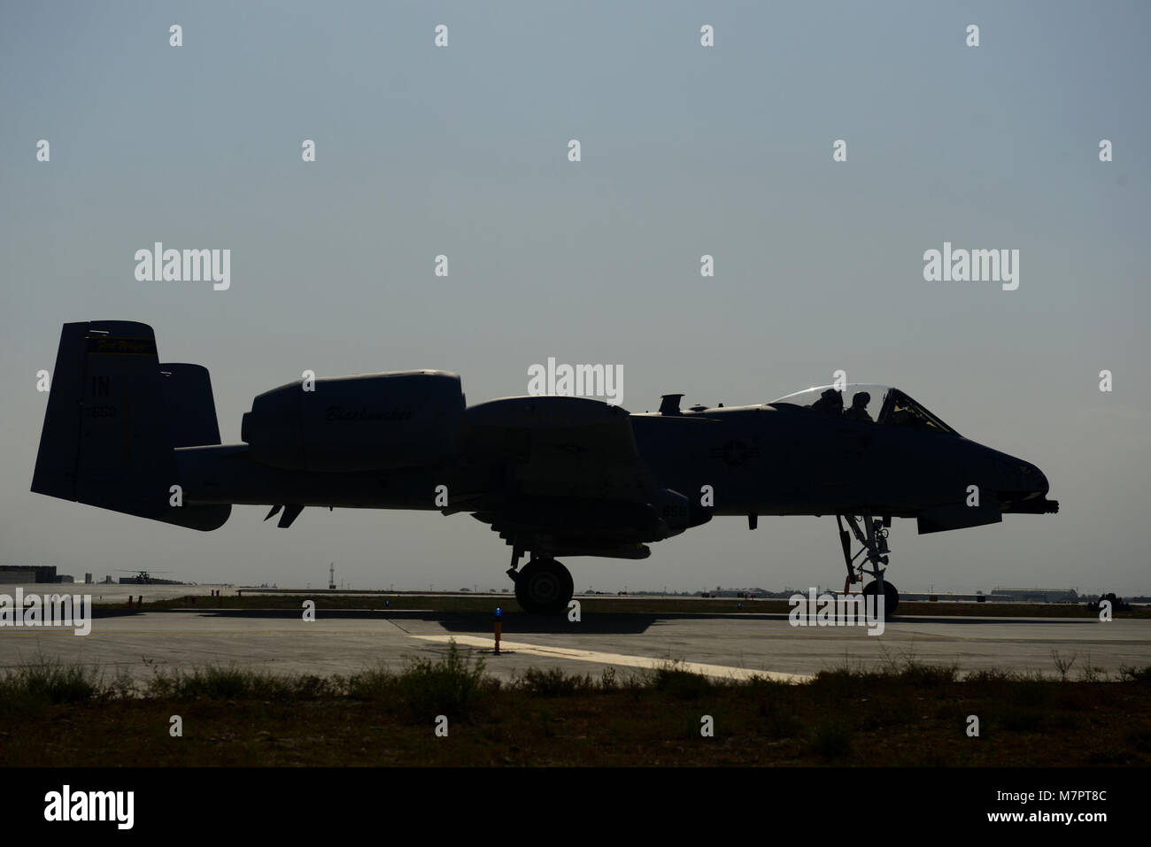 A U.S. Air Force A-10 Thunderbolt prepares for take off at Bagram Airfield, Afghanistan Oct. 24, 2014.  Deployed service members help operate 46 different types of aircraft in-and-out of the buisiest single runway airfield in the Department of Defense. (U.S. Air Force photo by Staff Sgt. Evelyn Chavez/Released) 455th Air Expeditionary Wing Bagram Airfield, Afghanistan Stock Photo