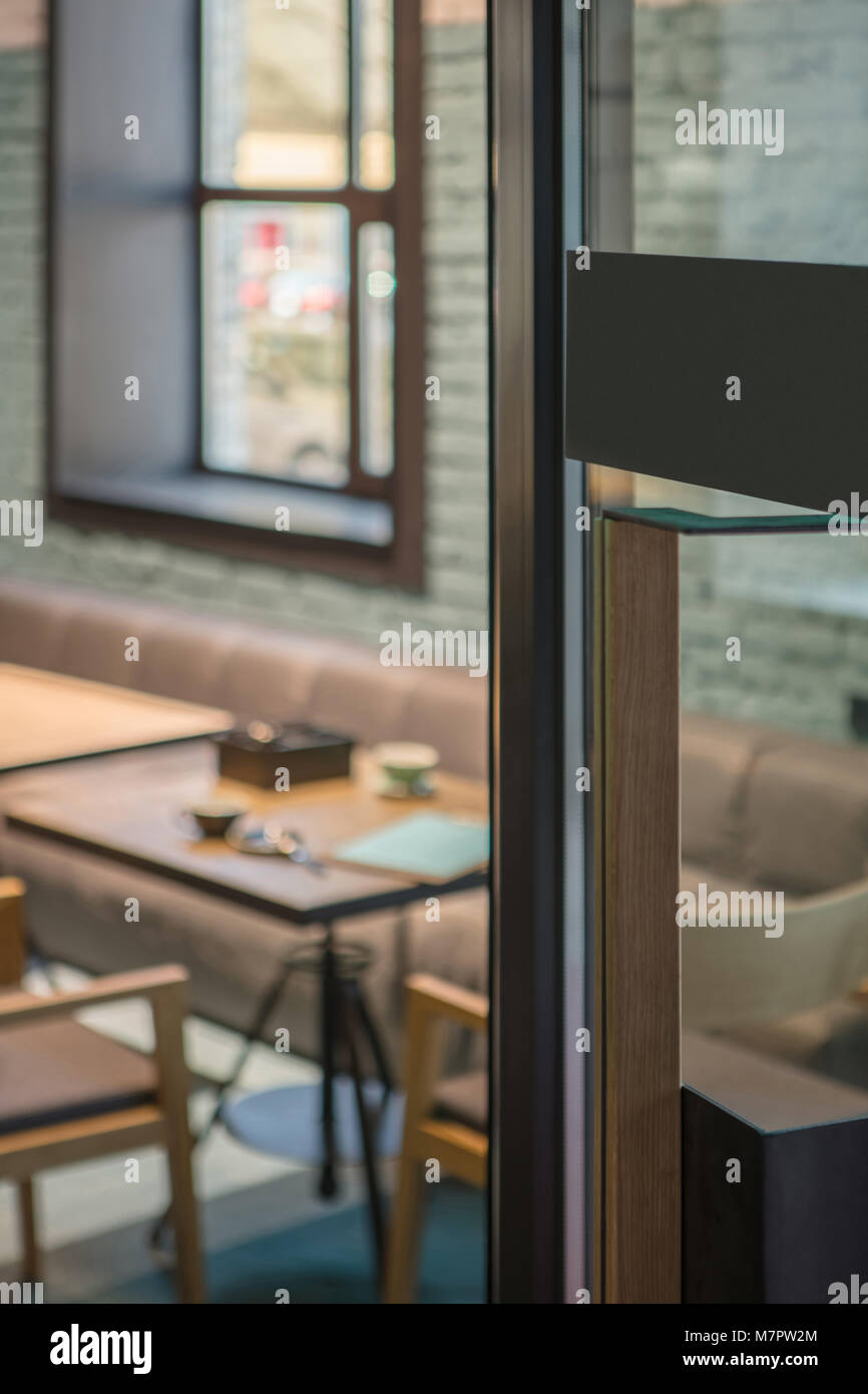 Restaurant door handle with pull sign on glass doors Stock Photo Alamy