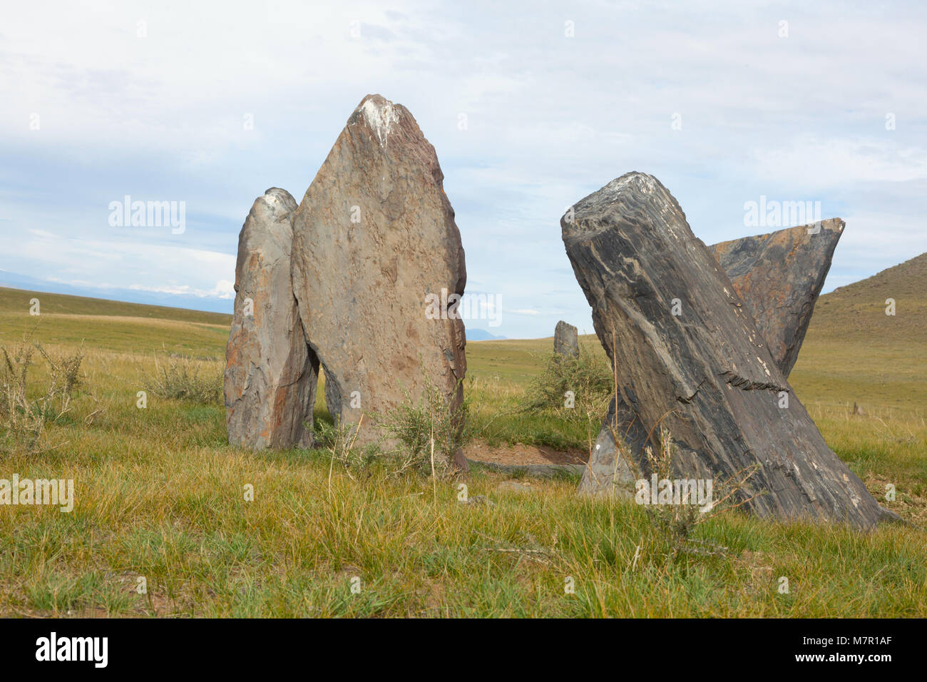 Ancient gravestones in the steppes of the Altai and Mongolia Stock Photo