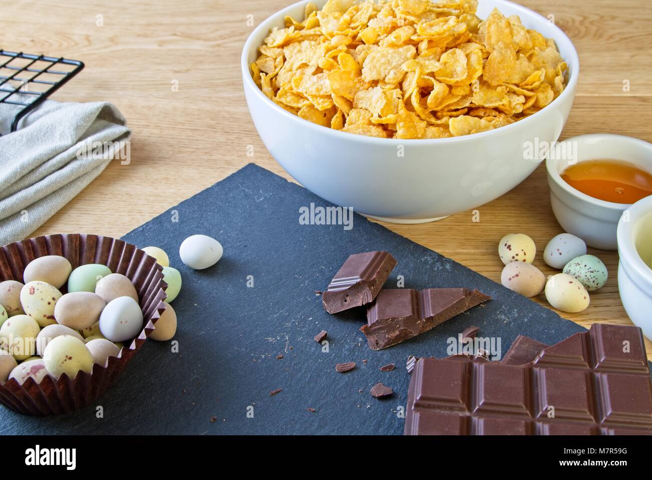 Easter corn flake cake baking ingredients with mini chocolate eggs Stock Photo Alamy