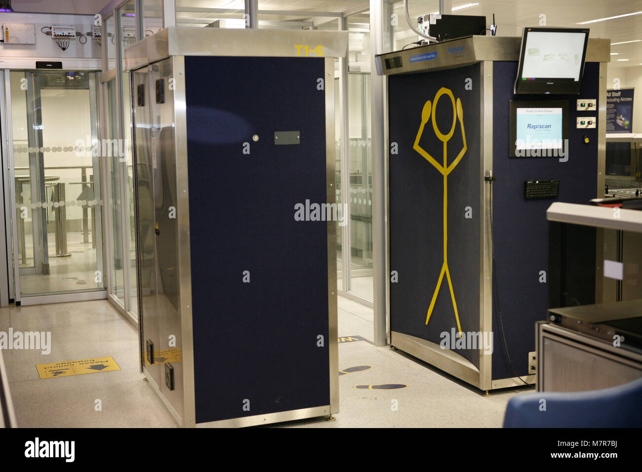 The 'Rapiscan' body scanner at the departures security. HM UK Border  Agency, Manchester Airport Stock Photo - Alamy