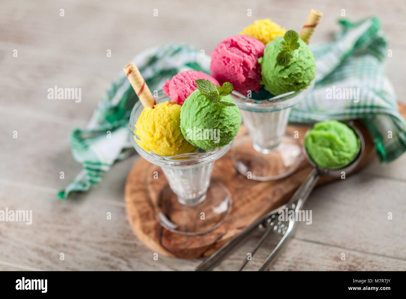 Tasty Homemade Ice Creams Pop With Sticks In Containers On Grey Stock  Photo, Picture and Royalty Free Image. Image 106122906.