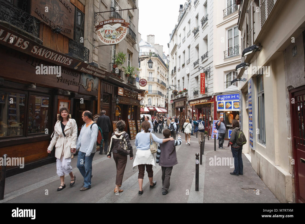 Paris, France - May 09, 2009. Visitors outside Rue Saint Severin in Little Athens, the Latin Quarter. Stock Photo