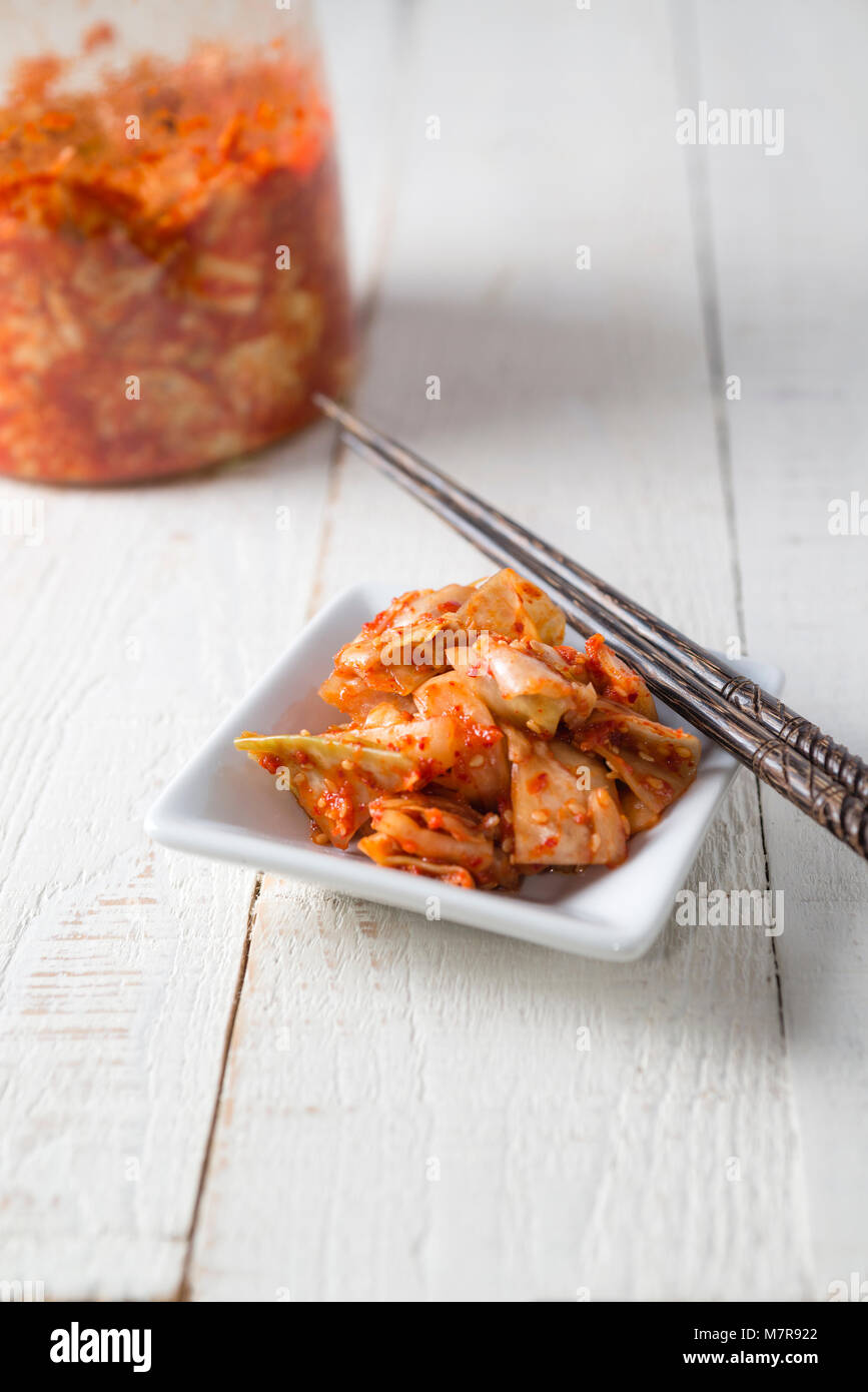 Korean kimchi - a fermented, spiced cabbage pickle. Stock Photo