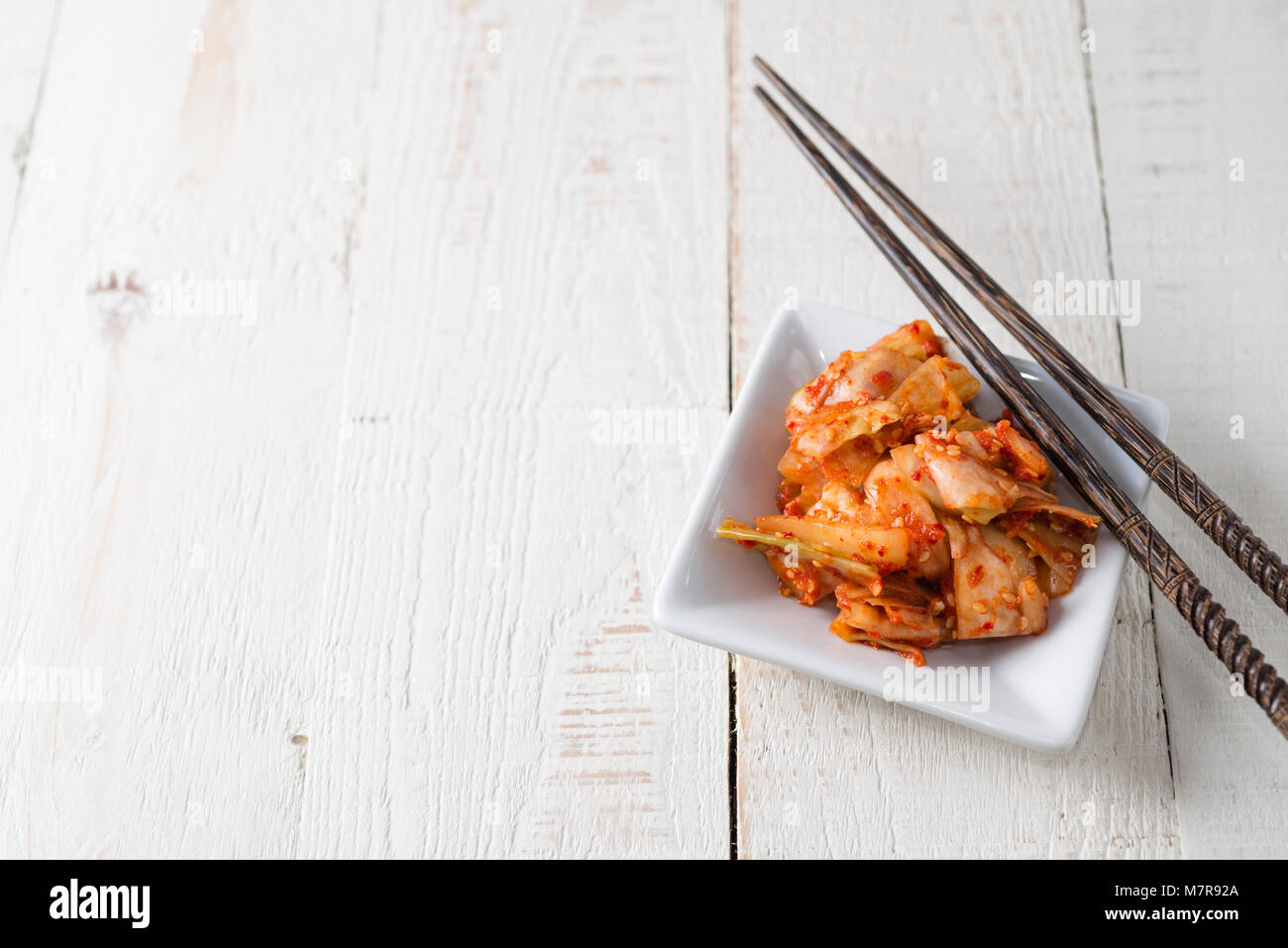 Korean kimchi - a fermented, spiced cabbage pickle. Stock Photo