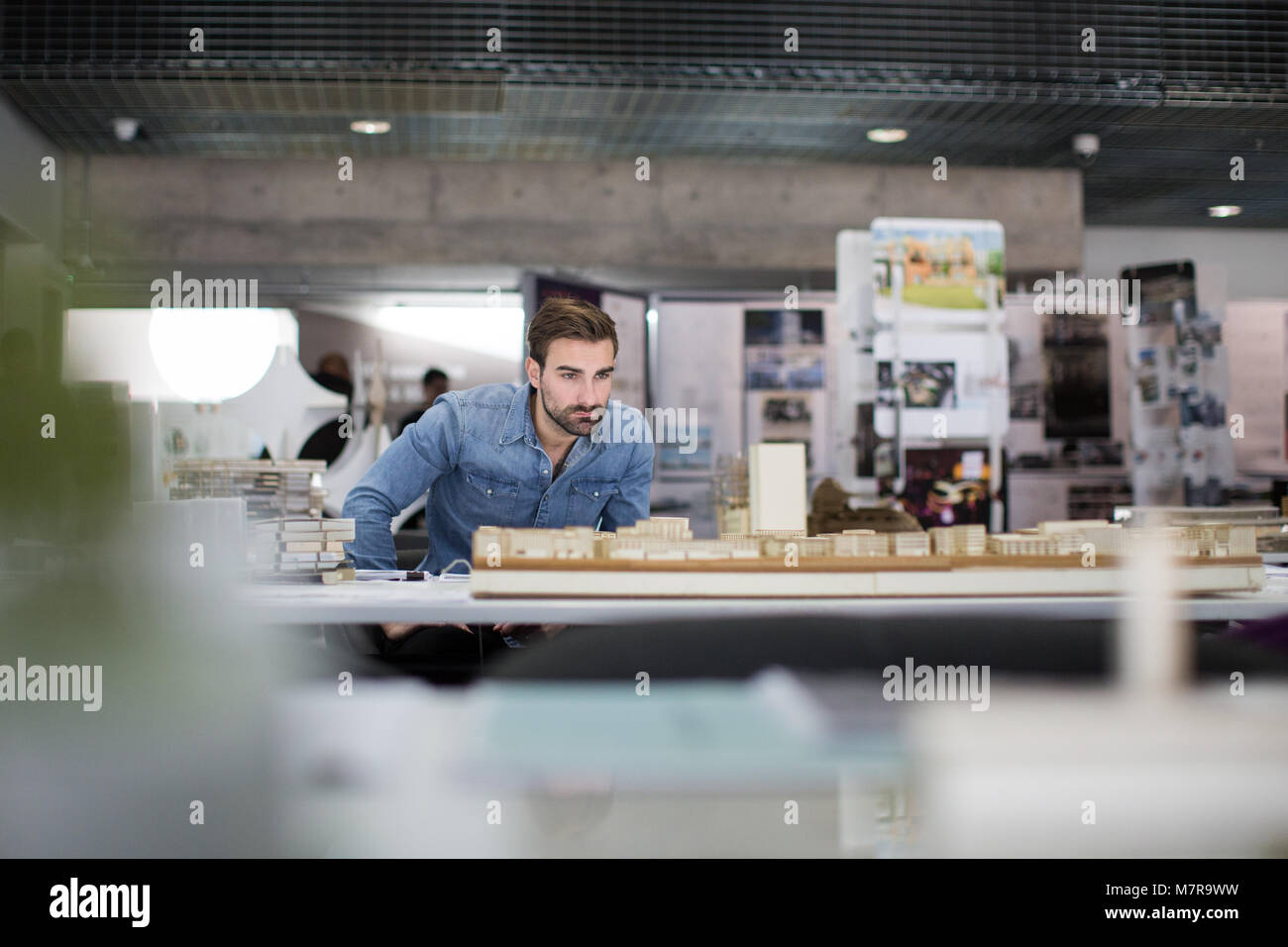 Architect studying model Stock Photo