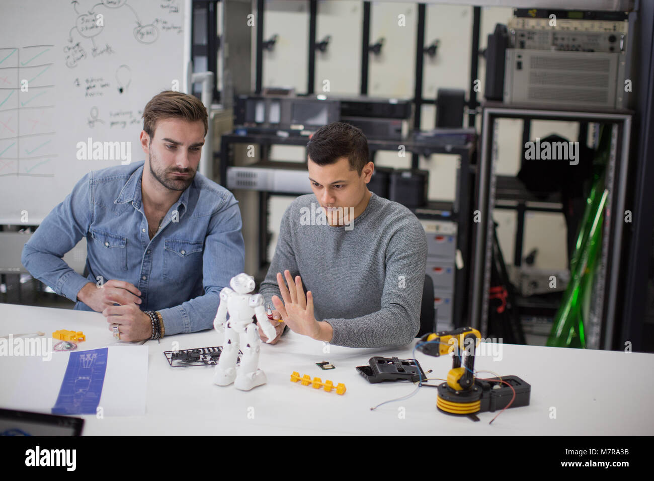 Team working on robotic technology Stock Photo