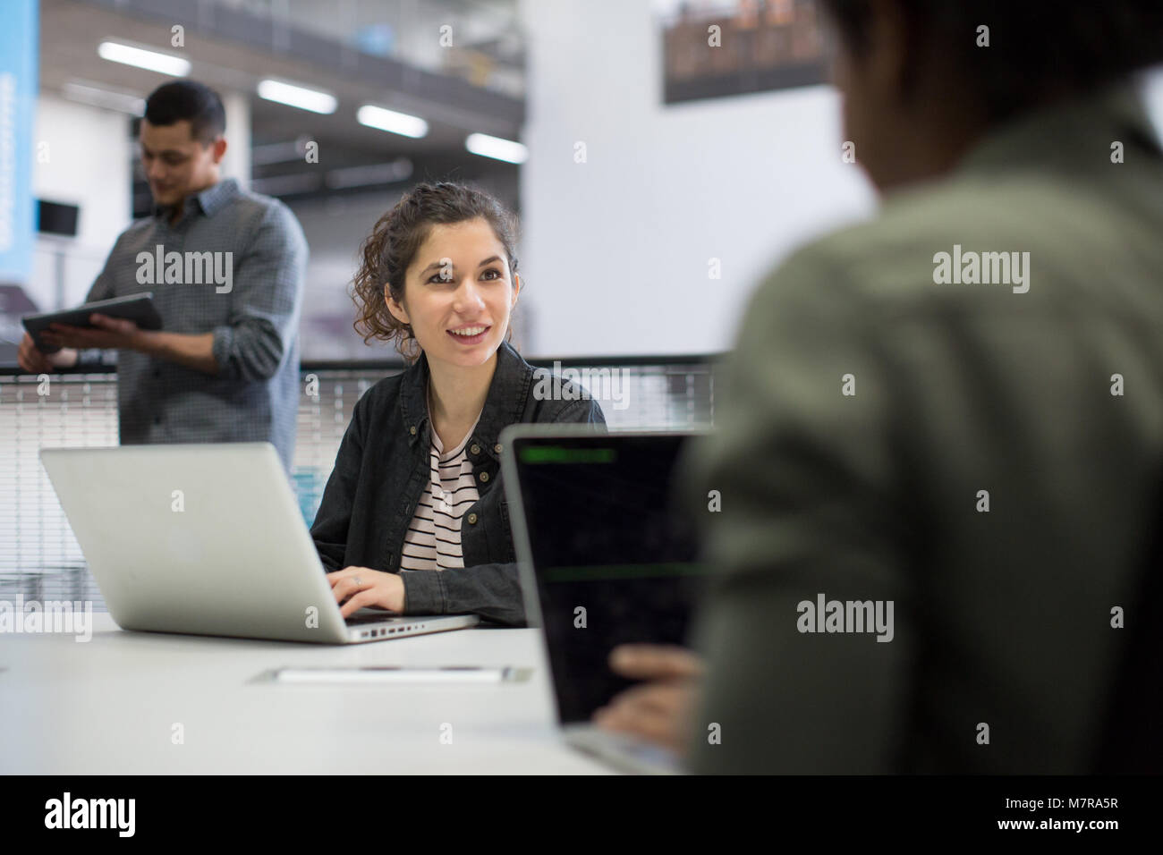 Coders working in an office Stock Photo