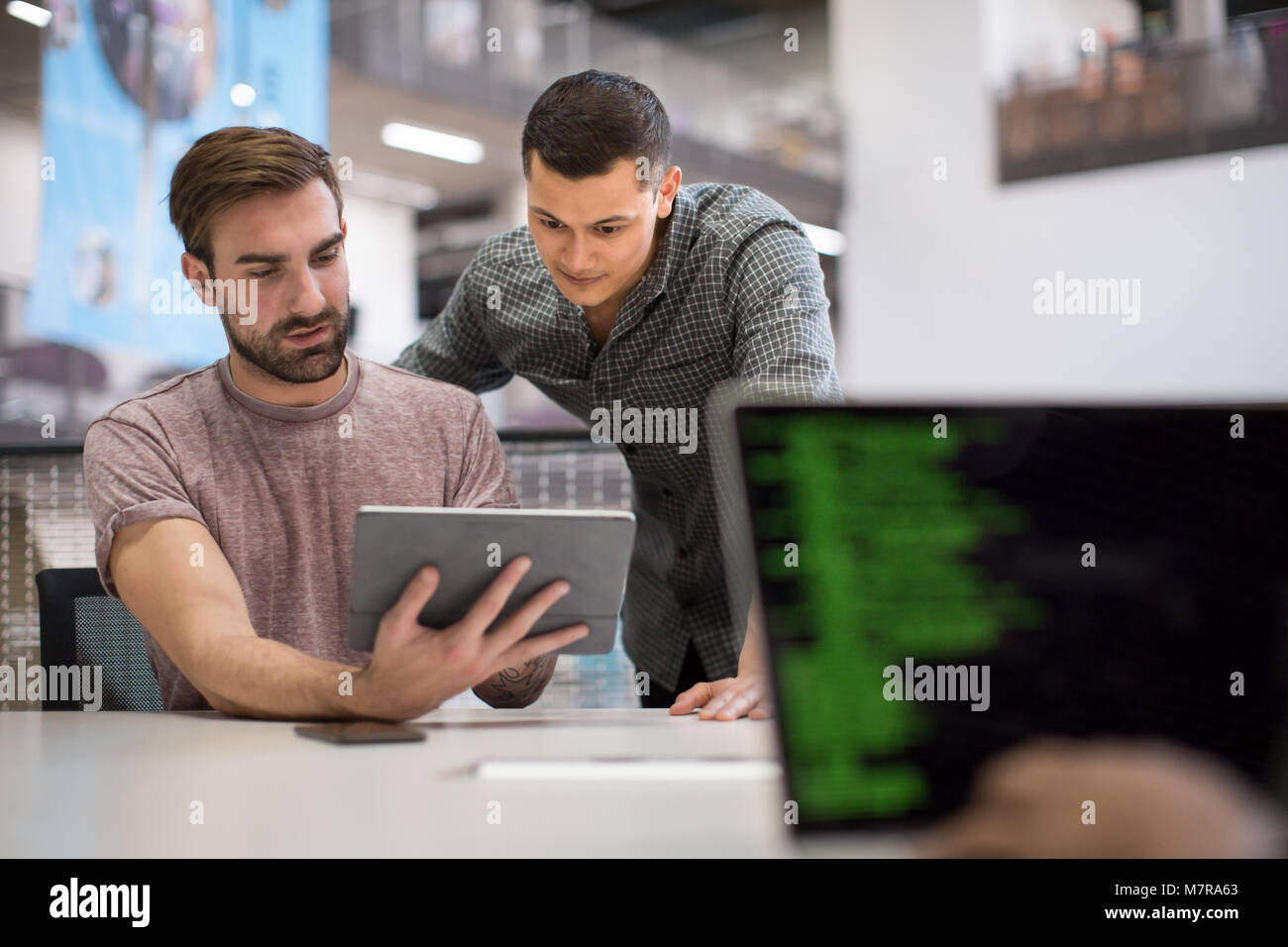 Coders working in an office Stock Photo