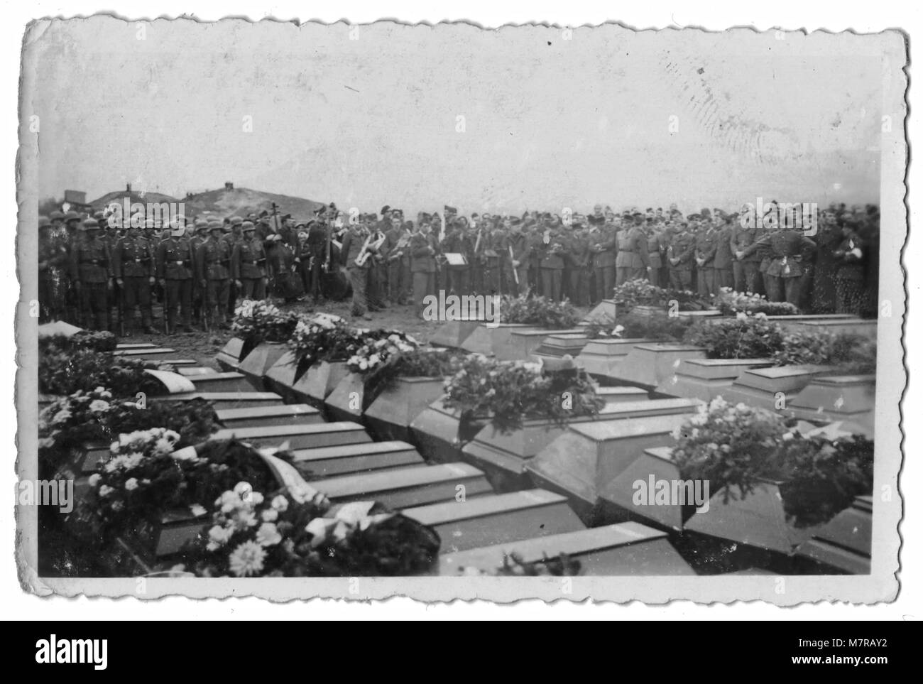 Mass Burial, Funeral of British Troops at a Cemetery in Germany near  Leipzig on February 27th, 1945, during World War Two, the Photographs are all stamped on the reverse with Stalag IV-A, Prisoner of War Camp Stock Photo