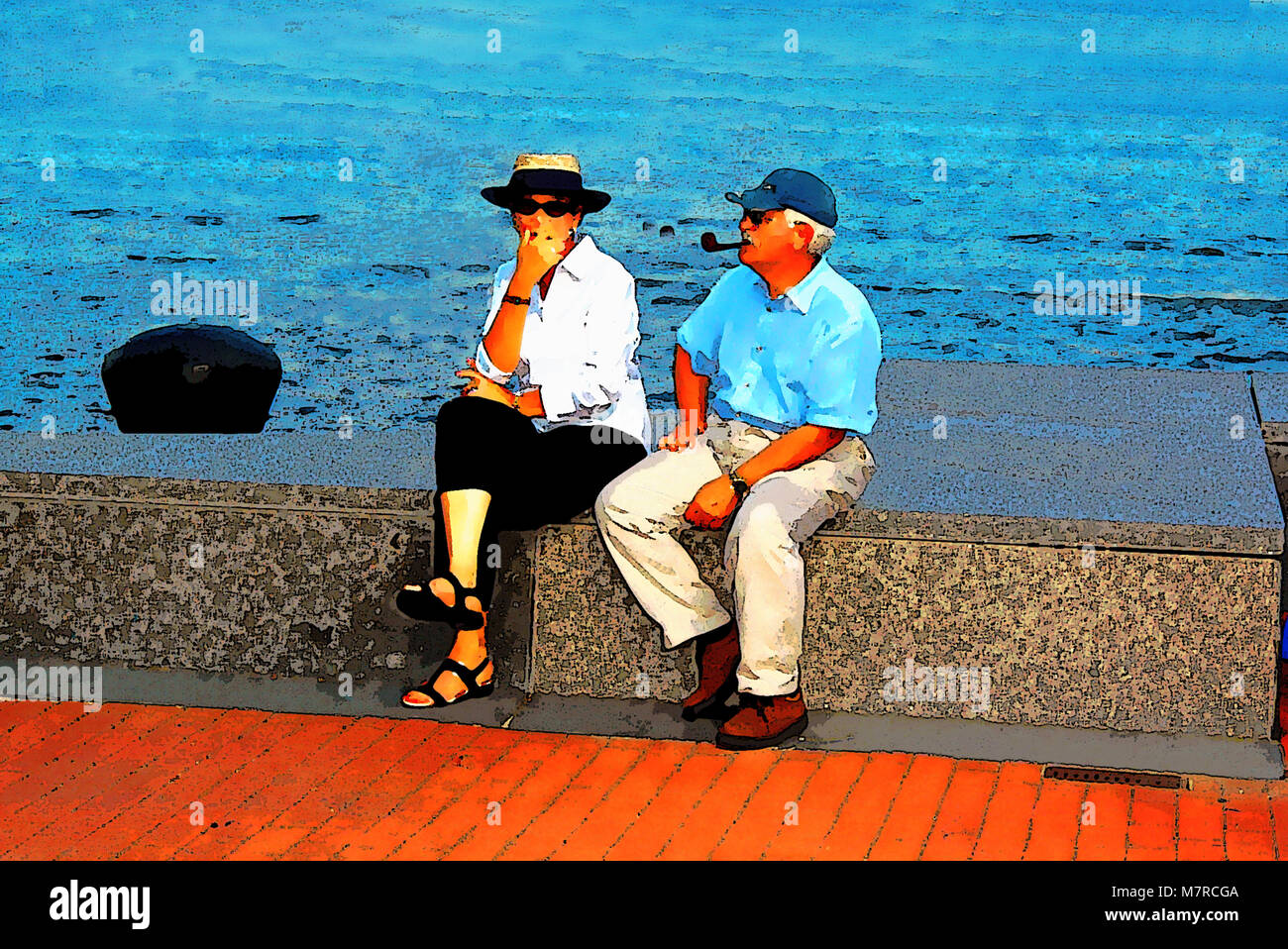 Couple sitting riverfront, Philadelphia, USA Stock Photo