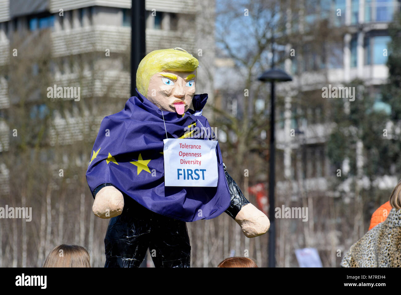 Donald Trump effigy wearing EU flag and carrying a placard reading 'Tolerance Openness Diversity First' at the Unite for Europe march in London, UK. Stock Photo
