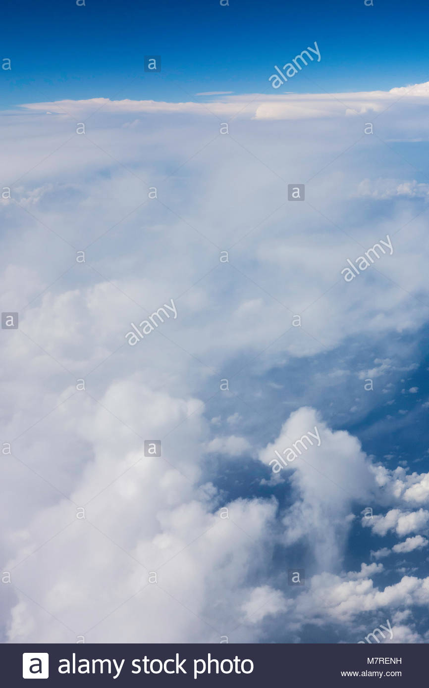 Warm moist air rising over mountainous Hawaiian islands create Stock