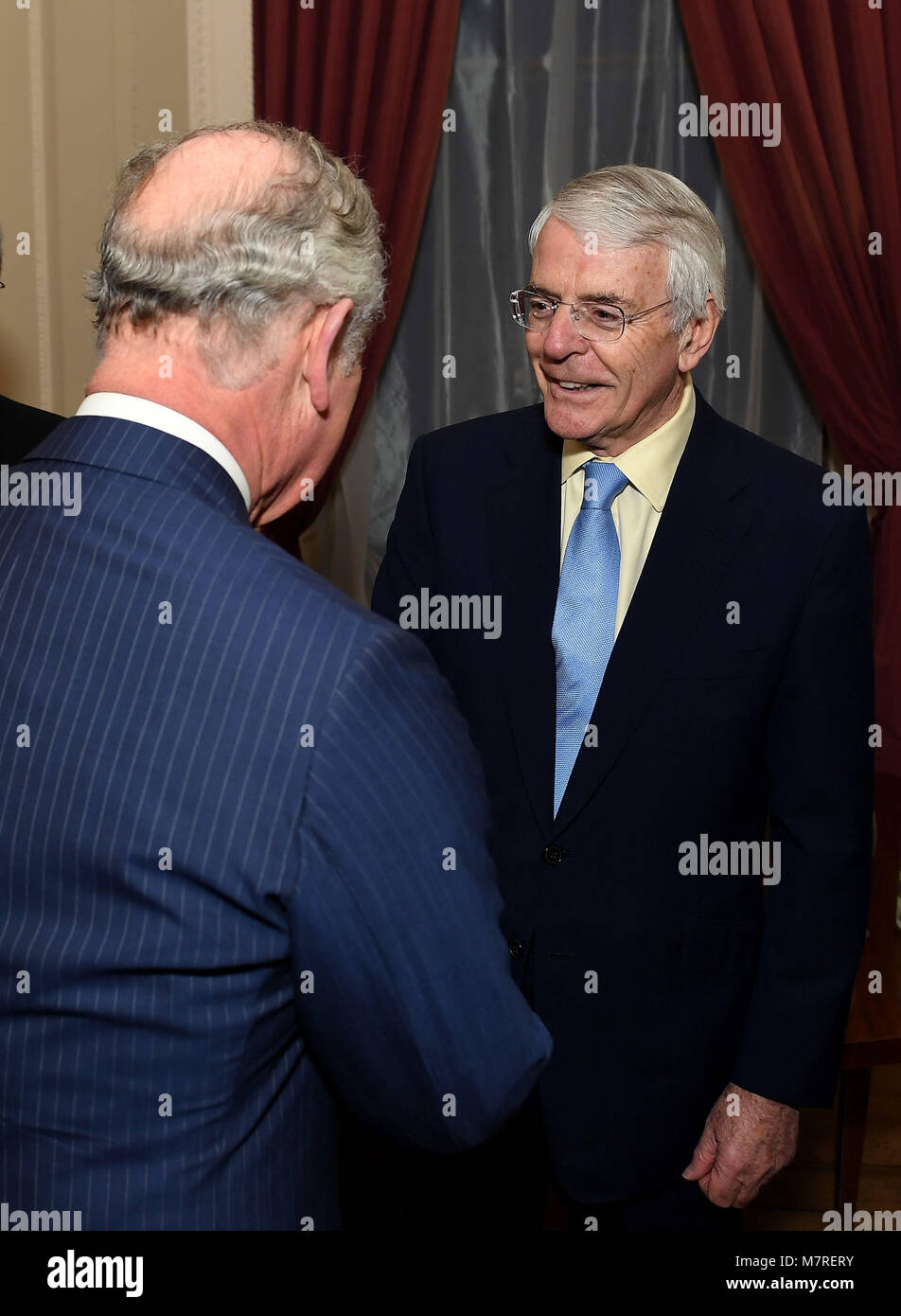 The Prince of Wales (left) talks to former Prime Minister John Major at a reception held by the Commonwealth Secretary-General, Rt Hon Patricia Scotland QC, at Marlborough House, the home of the Commonwealth Secretariat in London. Stock Photo