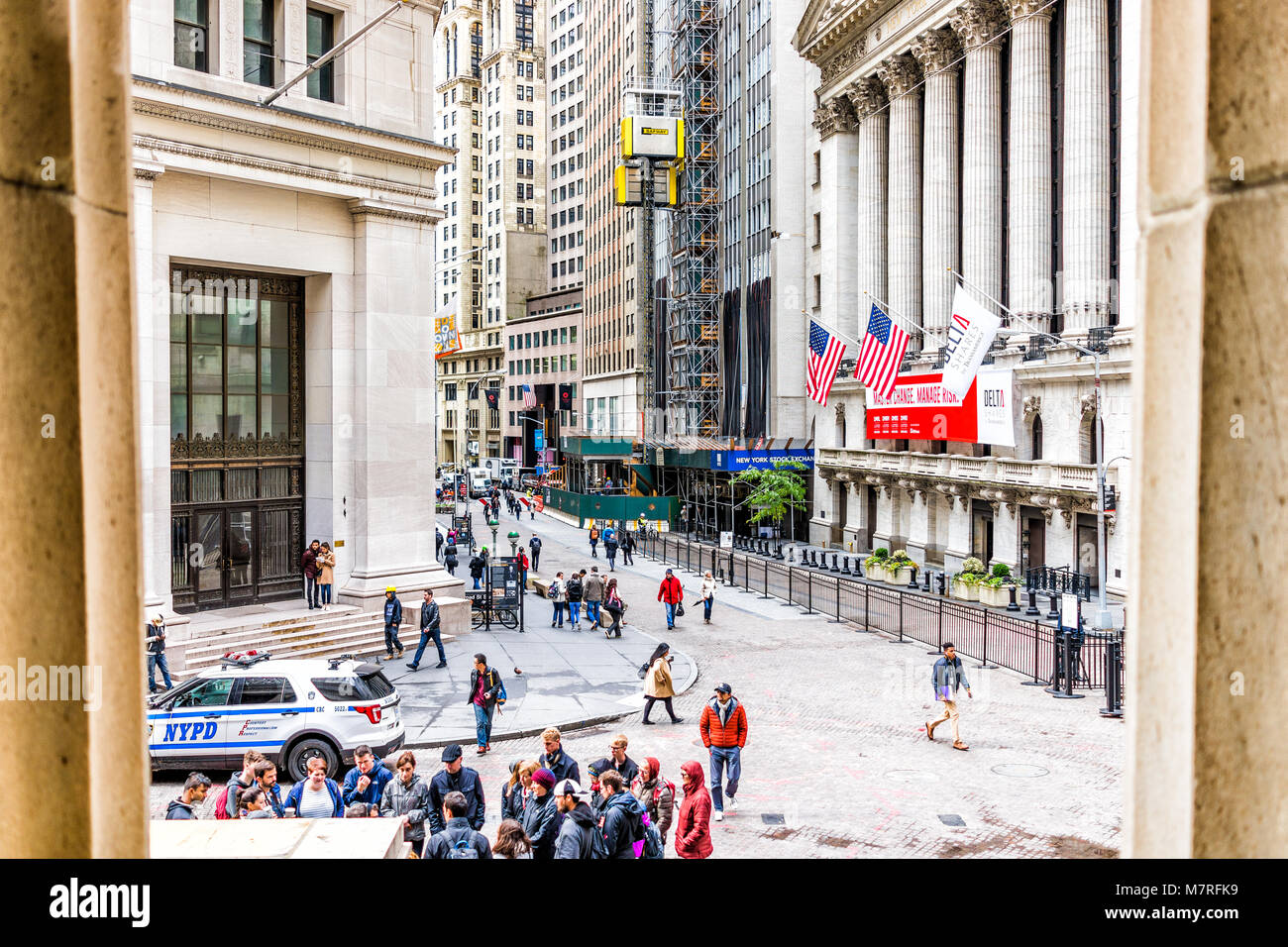 New York City, USA - October 30, 2017: Wall street NYSE stock exchange building entrance, construction scaffold, railing in NYC Manhattan lower financ Stock Photo