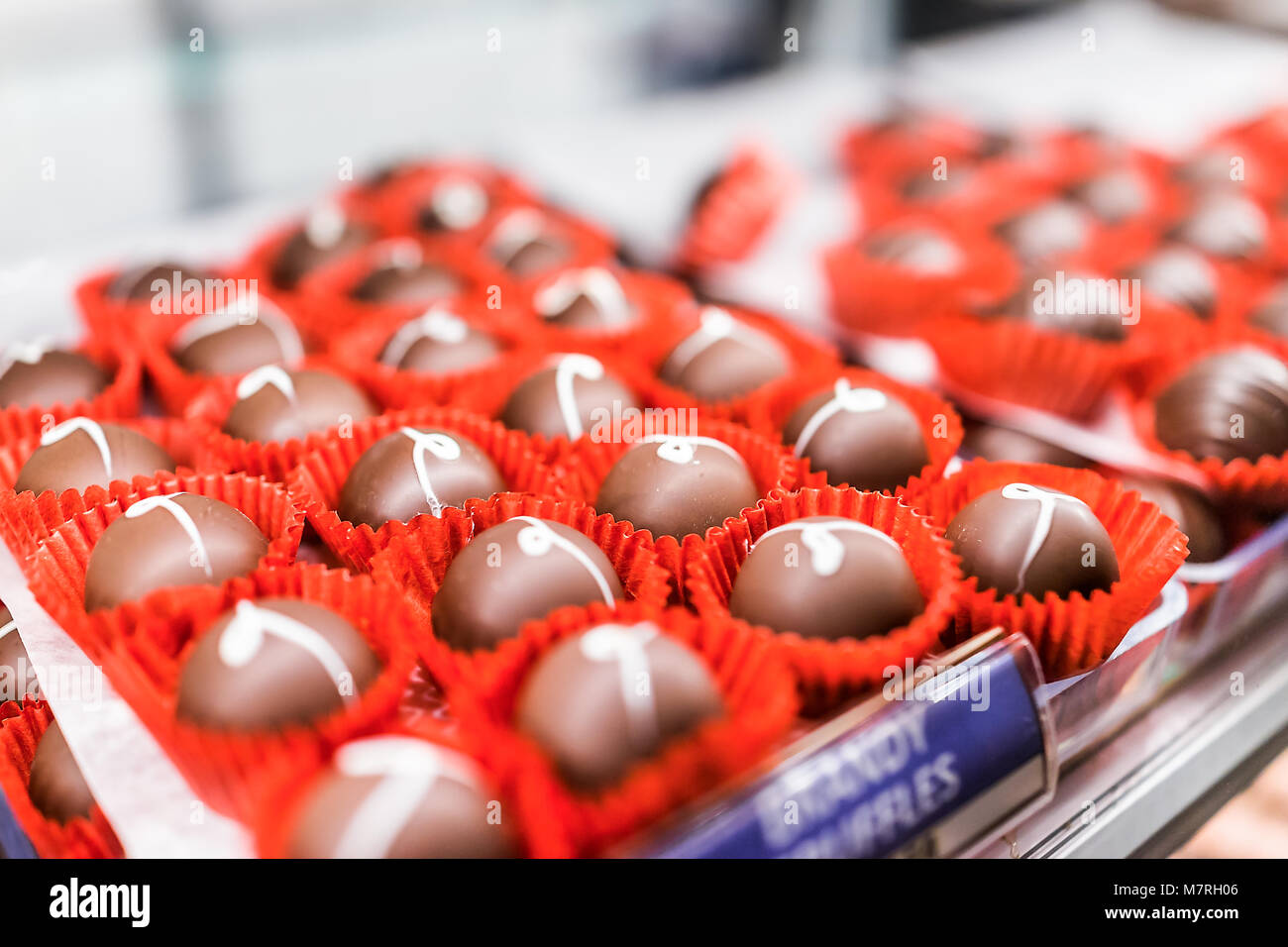 Shiny smooth gourmet milk, white and dark chocolate brandy alcoholic