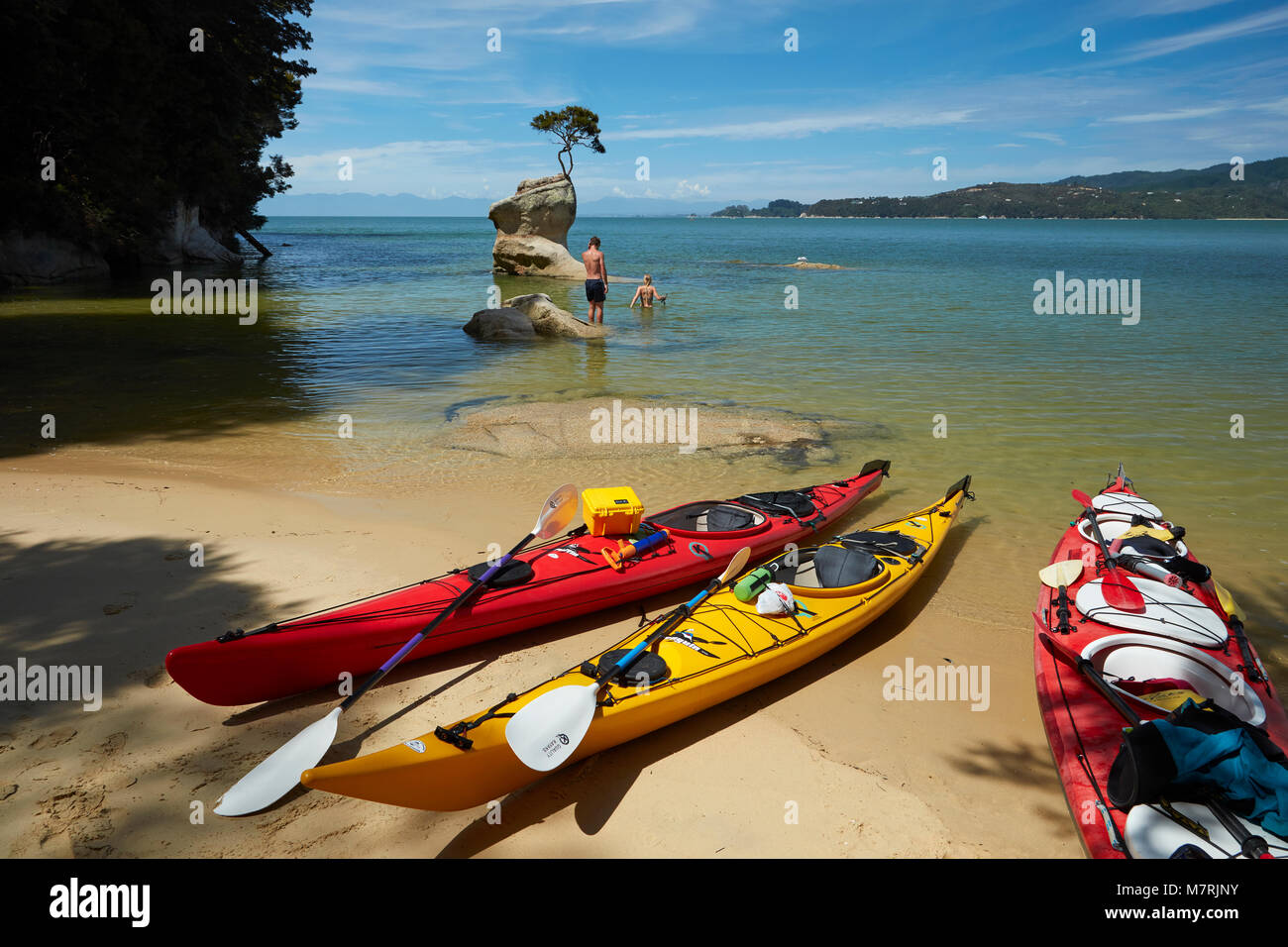 Kayaks and swimmers, Tinline Bay, Abel Tasman National Park, Nelson ...
