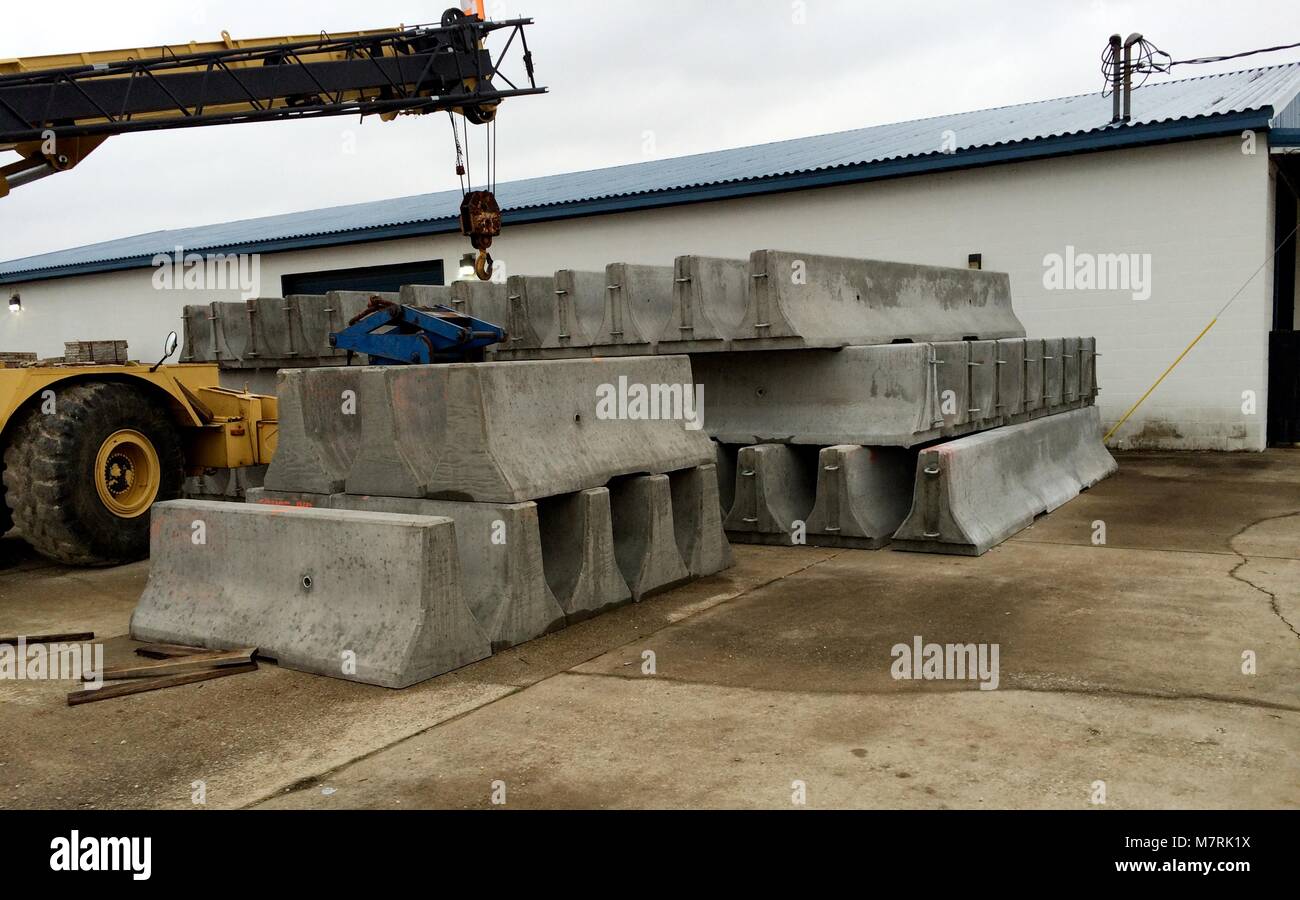 Concrete materials testing finishing bridge deck inspection cylinder strengths concrete barrier precast drainage drop box armored edge construction Stock Photo