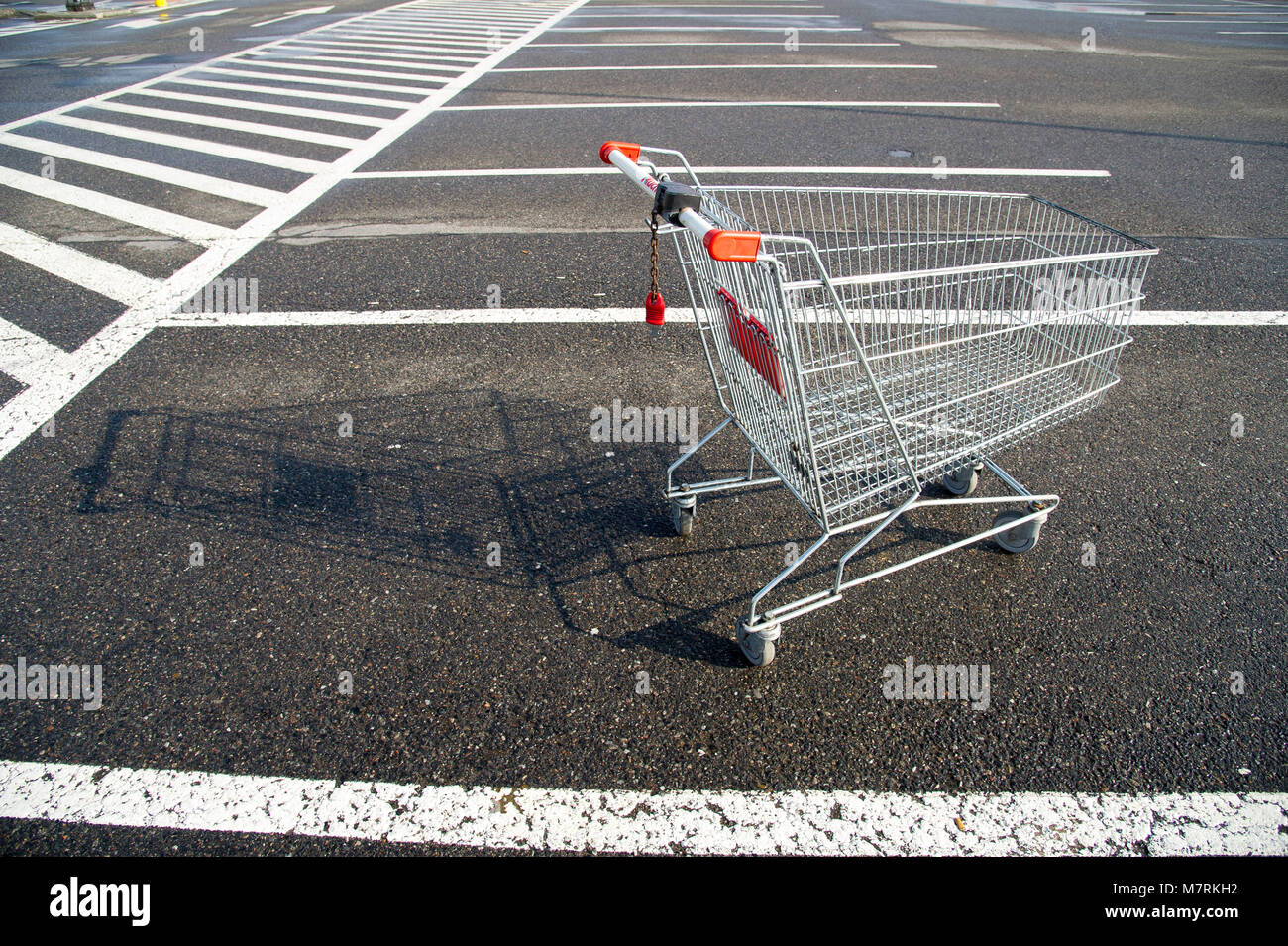 Parked Shopping Carts Equipped With Coin Operated Locking Mechanisms In Of Shopping Mall Auchan In The Beginning Of Law Restriction For Sunday Shoppin Stock Photo Alamy