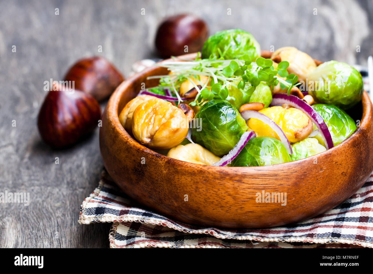 Christmas meal with brussels sprouts and roasted chestnuts Stock Photo