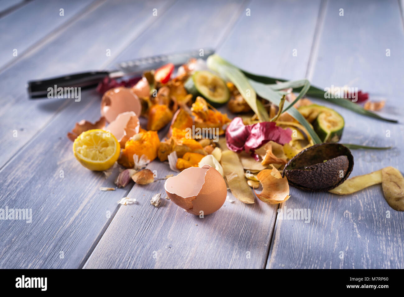 Organic leftovers, kitchen scraps, waste from vegetable ready for recycling and to compost. Collecting food leftovers for composting. Environmentally  Stock Photo