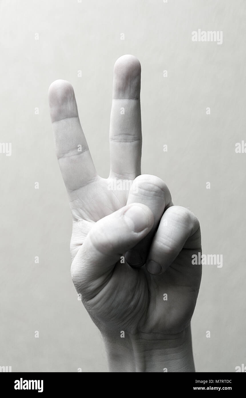 Two fingers up hi-res stock photography and images - Alamy