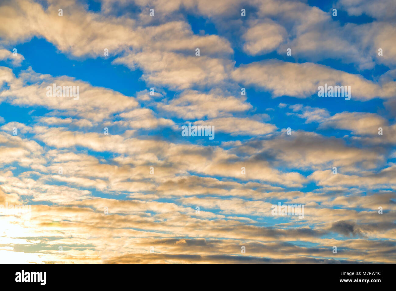 White and gray clouds in the blue sky above the sea Stock Photo - Alamy
