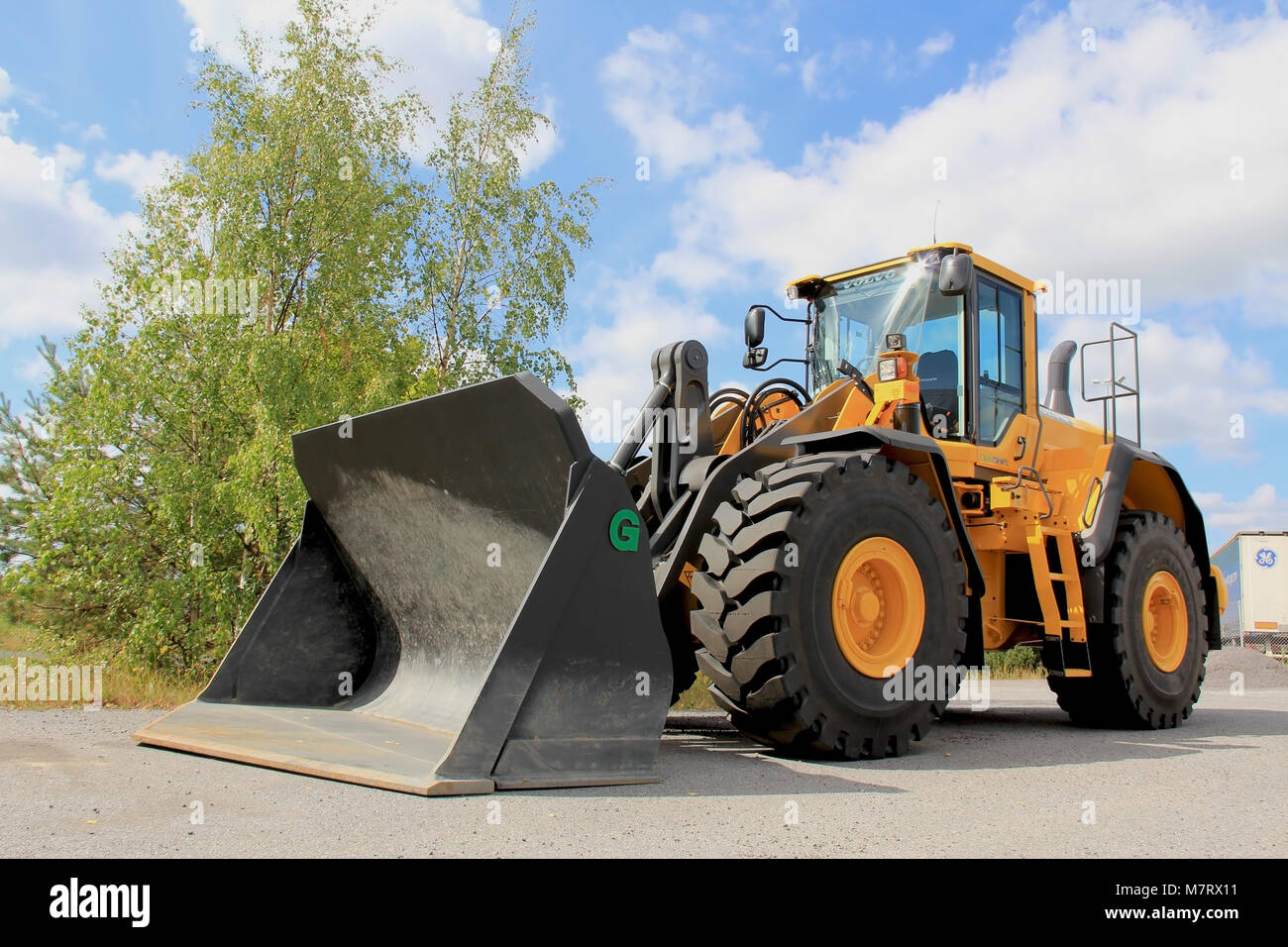 LIETO, FINLAND - AUGUST 3: Volvo L150G Wheel Loader on August 3, 2013 in Lieto, Finland. Volvo CE uses OptiShift technology in larger machinery like   Stock Photo
