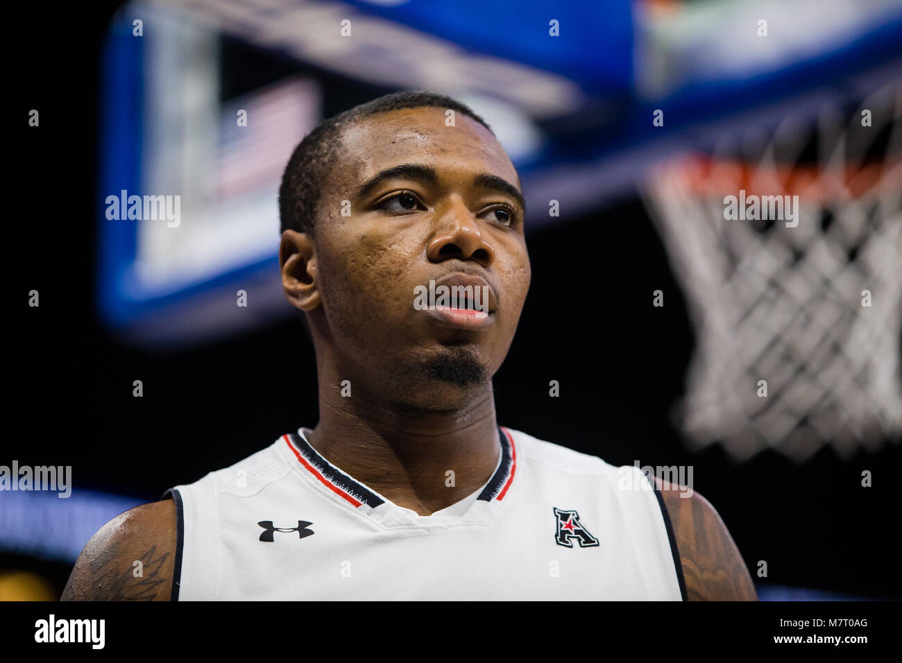 Cincinnati G Gary Clark paces the baseline during a timeout in the 2018 American Athletic Conference Championship game at the Amway Center in Orlando. Stock Photo