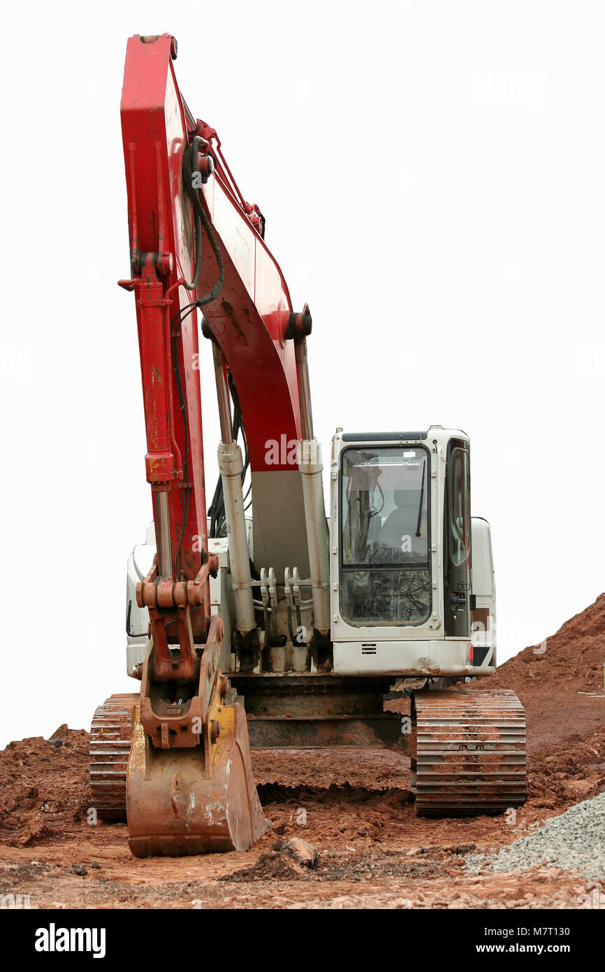 A isolated backhoe on dirt Stock Photo